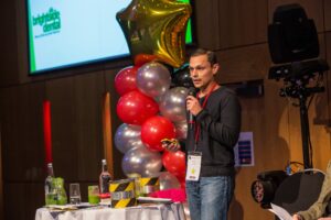 Ketan giving a talk to 150 dental professionals About some of the things working well at Brightside.